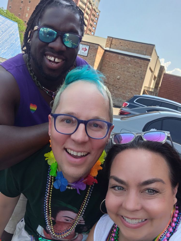 Three friends at the best Latino dance party at Chicago Pride