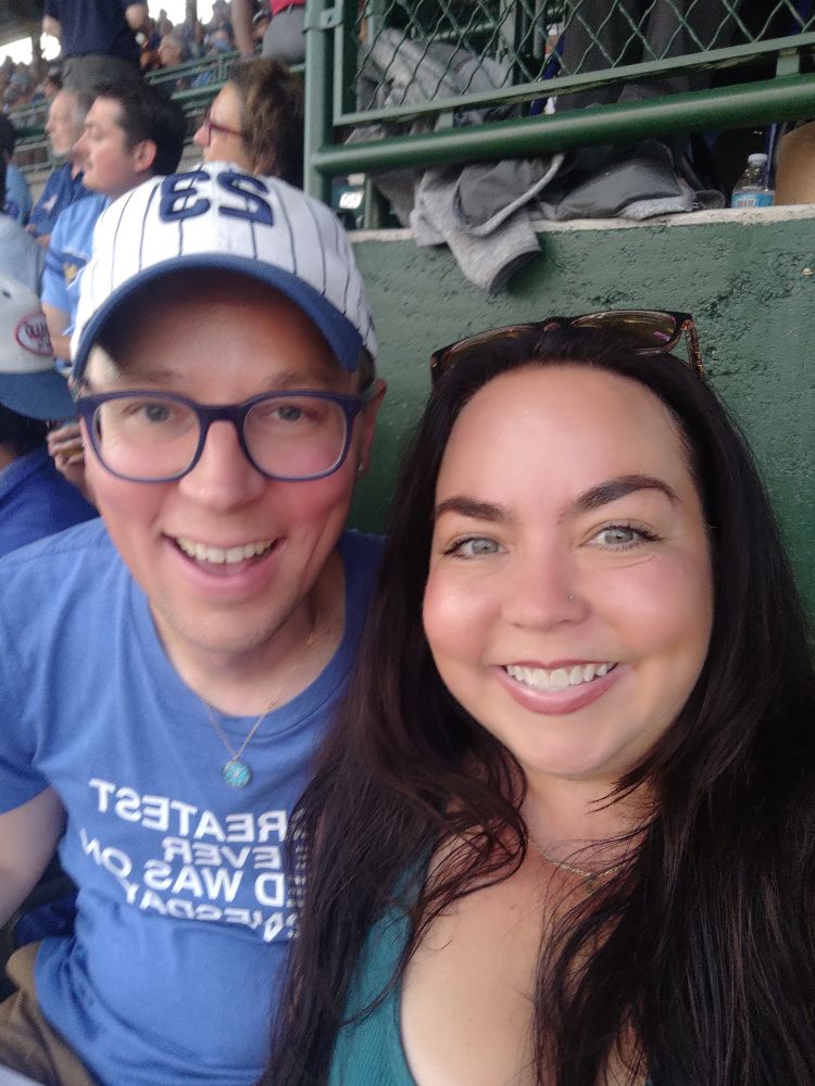 Two friends hanging out at Wrigley Field 