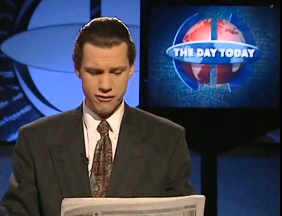 Chris Morris, reading tomorrow’s newspaper headlines.