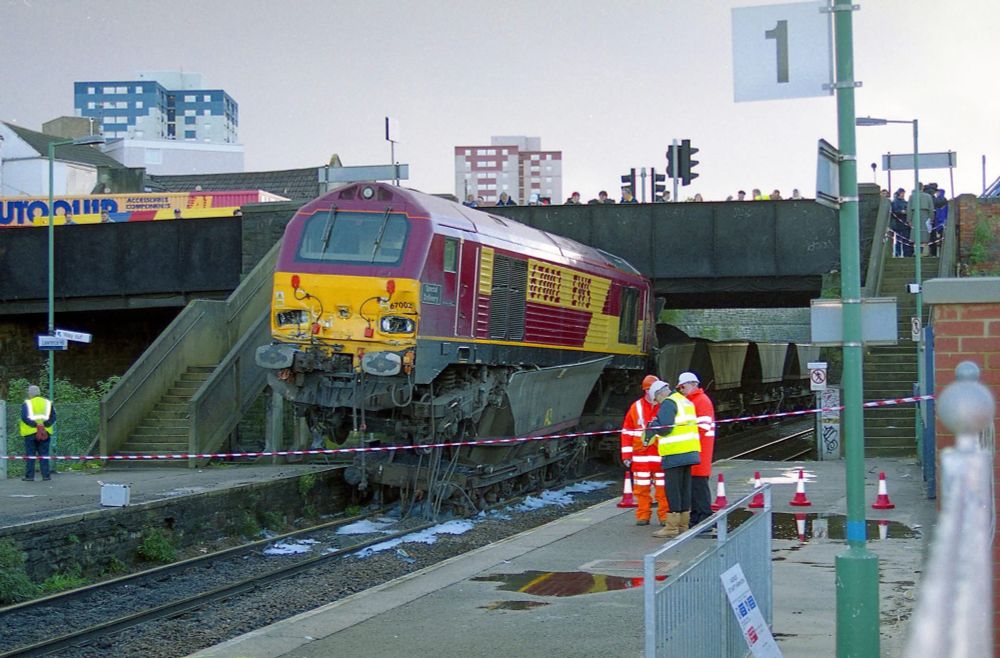 A diesel locomotive having mounted a freight hopper at Lawrence Hill.