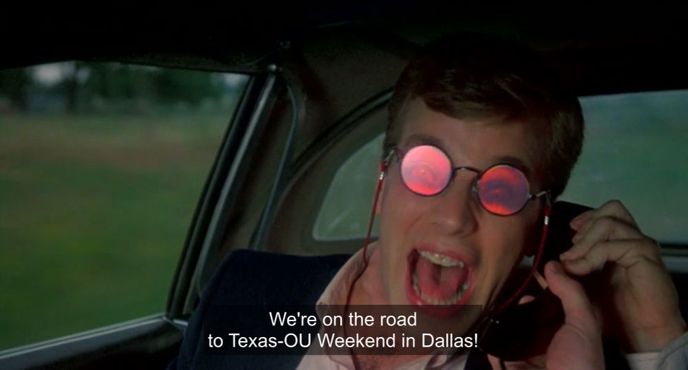 “We’re on the road to Texas-OU Weekend in Dallas!”

Screencap from The Texas Chainsaw Massacre 2