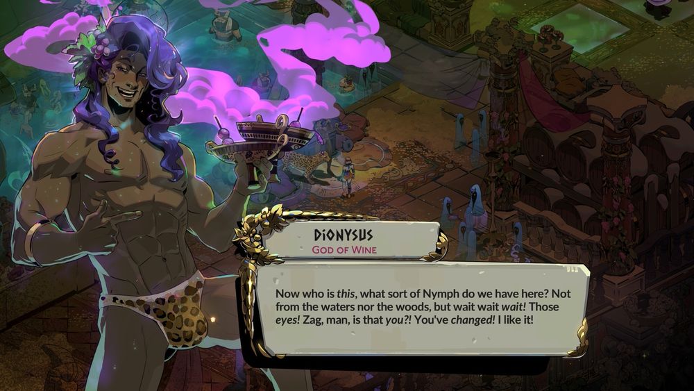 Screenshot from the game Hades II showing the character Dionysus, a muscular man with long purple hair, a crown of grapevines, and a leopard-print cloth around his waist, holding a goblet with purple smoke. He is speaking in a dialogue box that reads: “Now who is this, what sort of Nymph do we have here? Not from the waters nor the woods, but wait wait wait! Those eyes! Zag, man, is that you?! You’ve changed! I like it!” The background depicts a colorful, ornate temple area with statues and greenery.