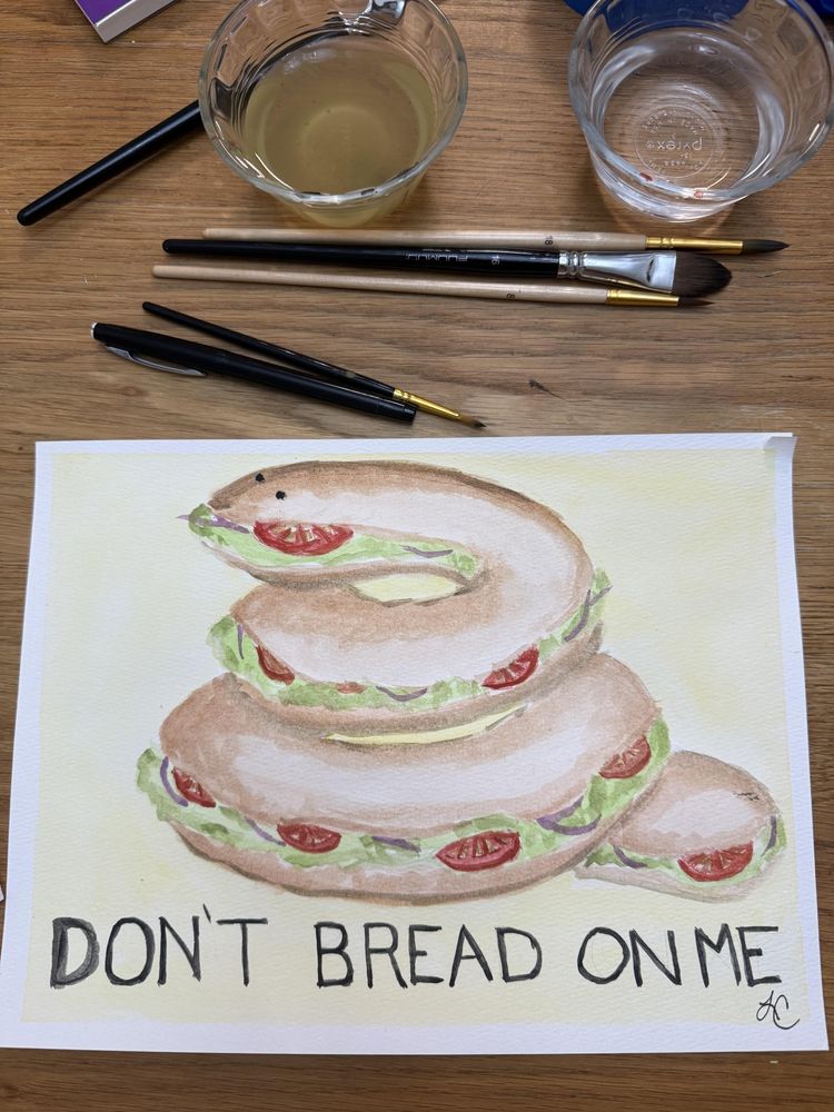 Subway sandwich shaped like a coiled rattler with a 