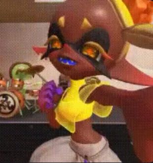 Frye from the game splatoon punching the air 