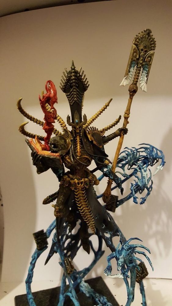 A skeletal figure lifted into the air by spirits of the damned. 