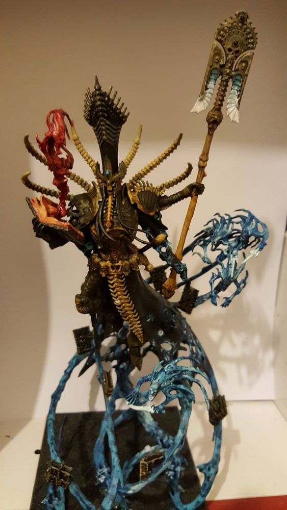 A skeletal figure lifted into the air by spirits of the damned. 