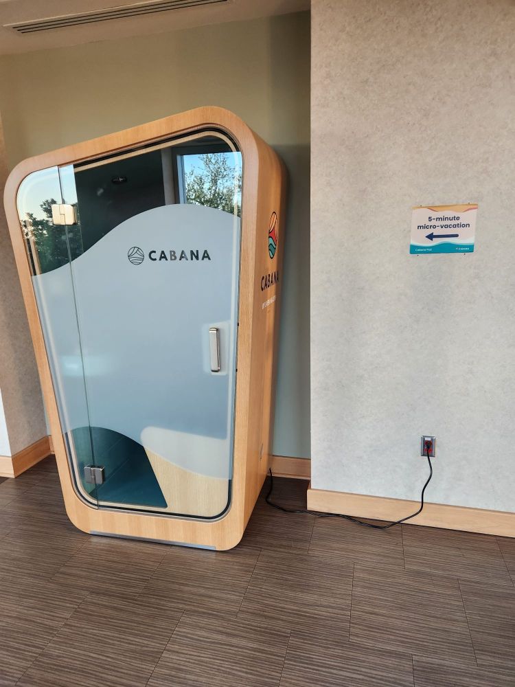 What looks like a glass-fronted closet, its body made with light wood and the word "Cabana" on the front, sits quietly, ominously, against a nondescript wall. It's waiting for you...