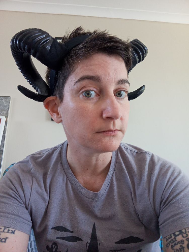 Me wearing some black rams' horns