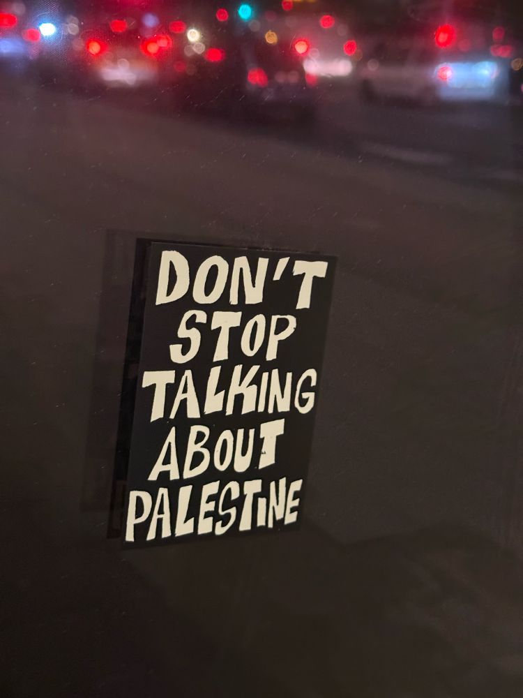 A sticker that reads “Don’t Stop Talking About Palestine”