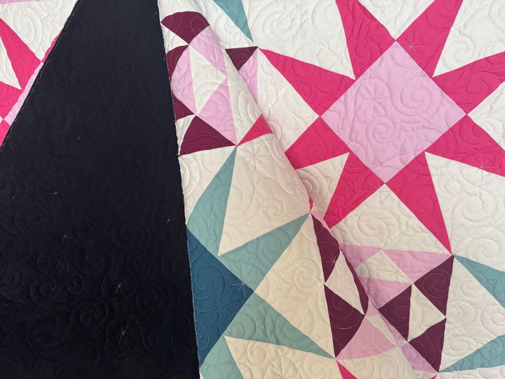 Zoom in on back and front of quilt