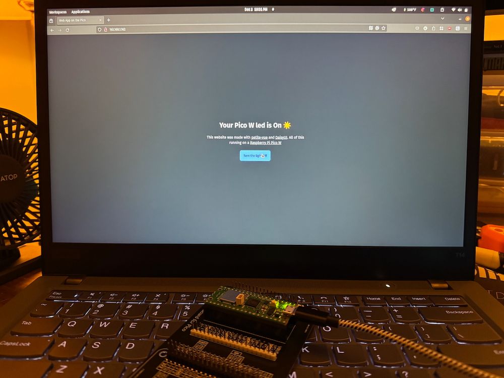 Picture of a Pico w 1 sitting on a ThinkPad with the onboard LED on. The ThinkPad is open to a web page running from the Pico that says
Your Pico W led is On ☀️

This website was made with petite-vue and DaisyUI. All of this running on a Raspberry Pi Pico W

Then a button saying turn the light off
