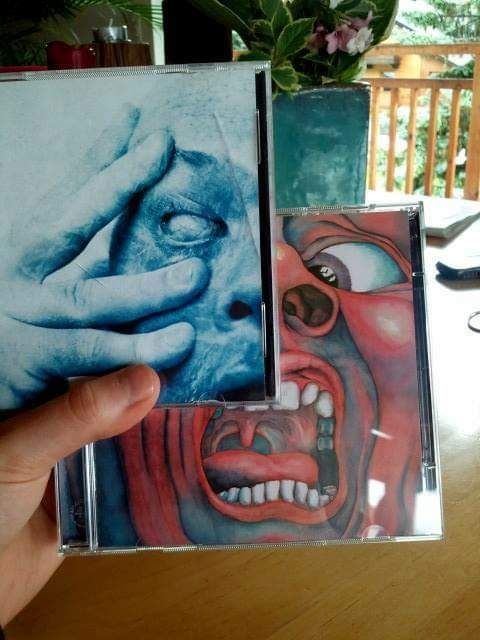 Album cover of Porcupine Tree's 'In Absentia' (2002) overlaid across that of King Crimson's 'In the Court of the Crimson King' (1969)