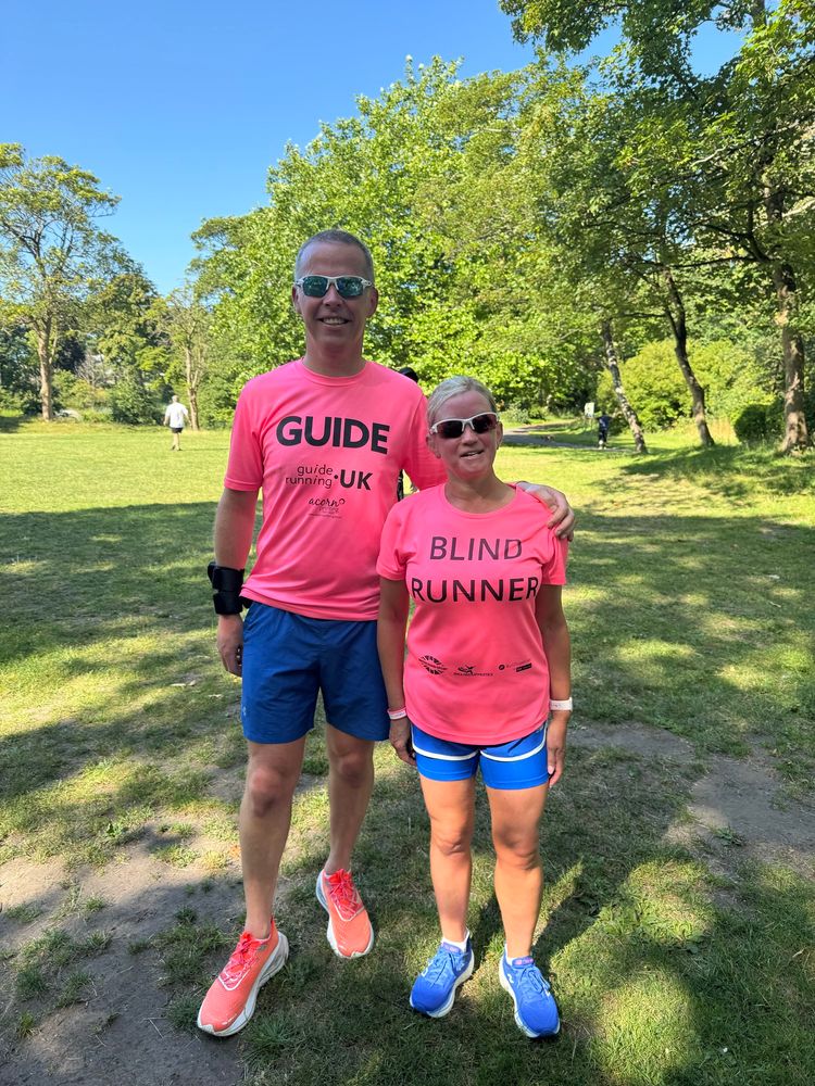 Kelly and Mike in the sunshine at the end of parkrun 