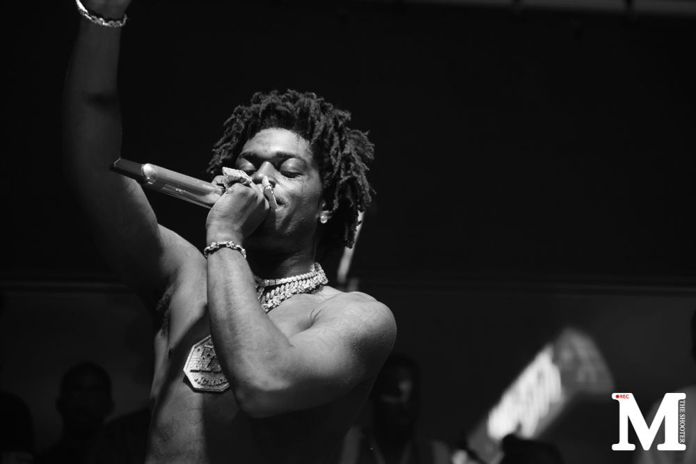Kodak Black singing in black and white