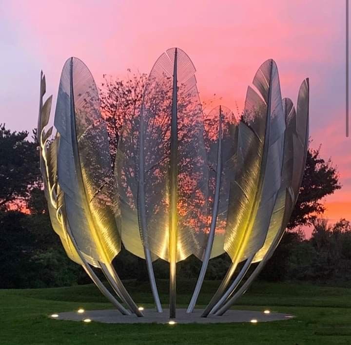 A picture of the "Kindred Spirits" memorial in Ireland. 9 tall metal feathers stand upright with a pink evening sky behind.
Created by artist Alex Pentek, Kindred Spirits commemorates the 1847 donation by the Native American Choctaw people to Irish famine relief during the Great Hunger, despite the Choctaw themselves living in hardship and poverty and having recently endured the Trail of Tears.[2][3][4] While records of the exact amount of the donation vary, the figure usually given is US$170[5] (about $5,600 in 2023 inflation-adjusted dollars, though some methods indicate it could have been as high as $20,000 in 2015 dollars).