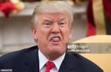 Donald Trump looking angry at the world.