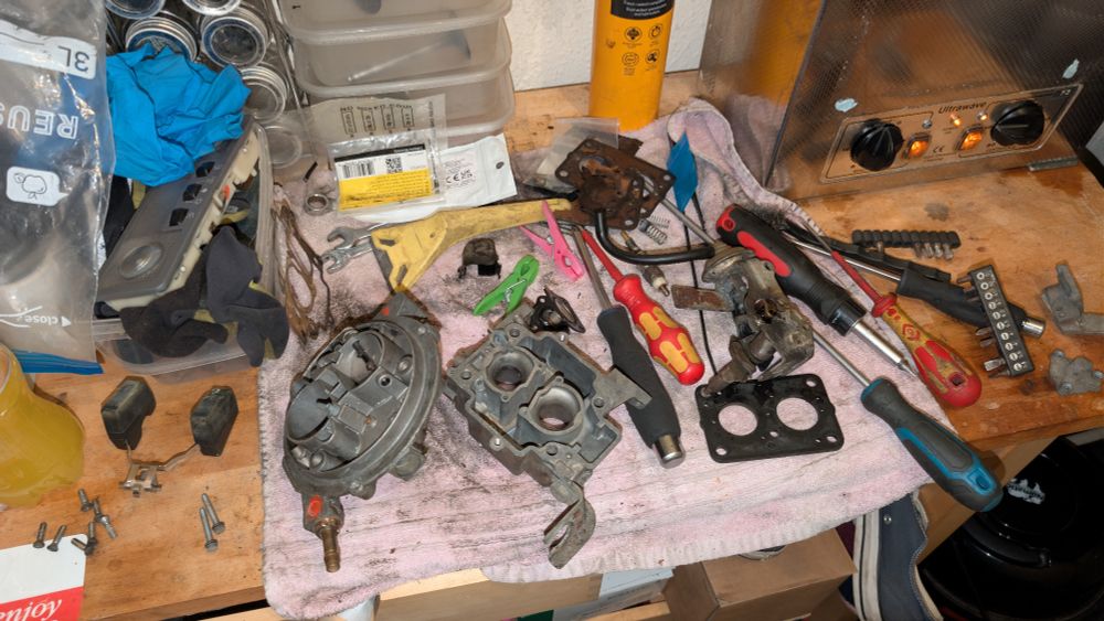 Weber 26/28TLDM 15A1 for a 1990 Ford Fiesta 1.1 set out on a workbench.