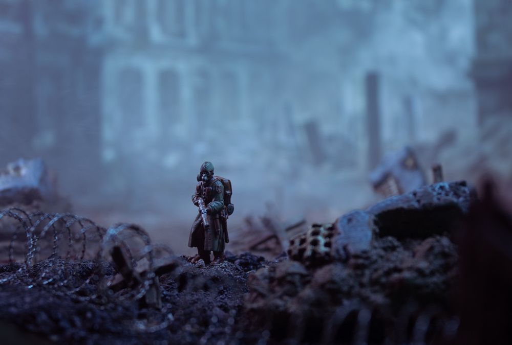 Some Trench Crusade minis hanging out in front of one of the first Trench Crusade Backdrops