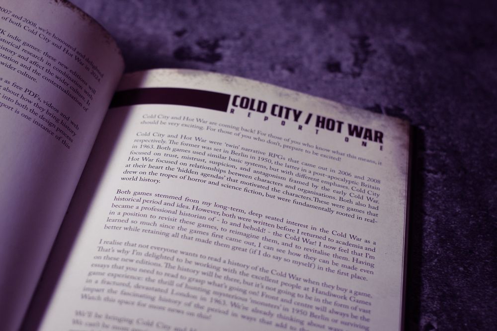A close up on pages from the unique, one-off, Cold City Hot War Reports One to Seven. This show the introduction to report one.