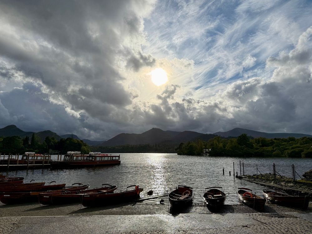 Sun shining on Derwentwater in the Lake District.