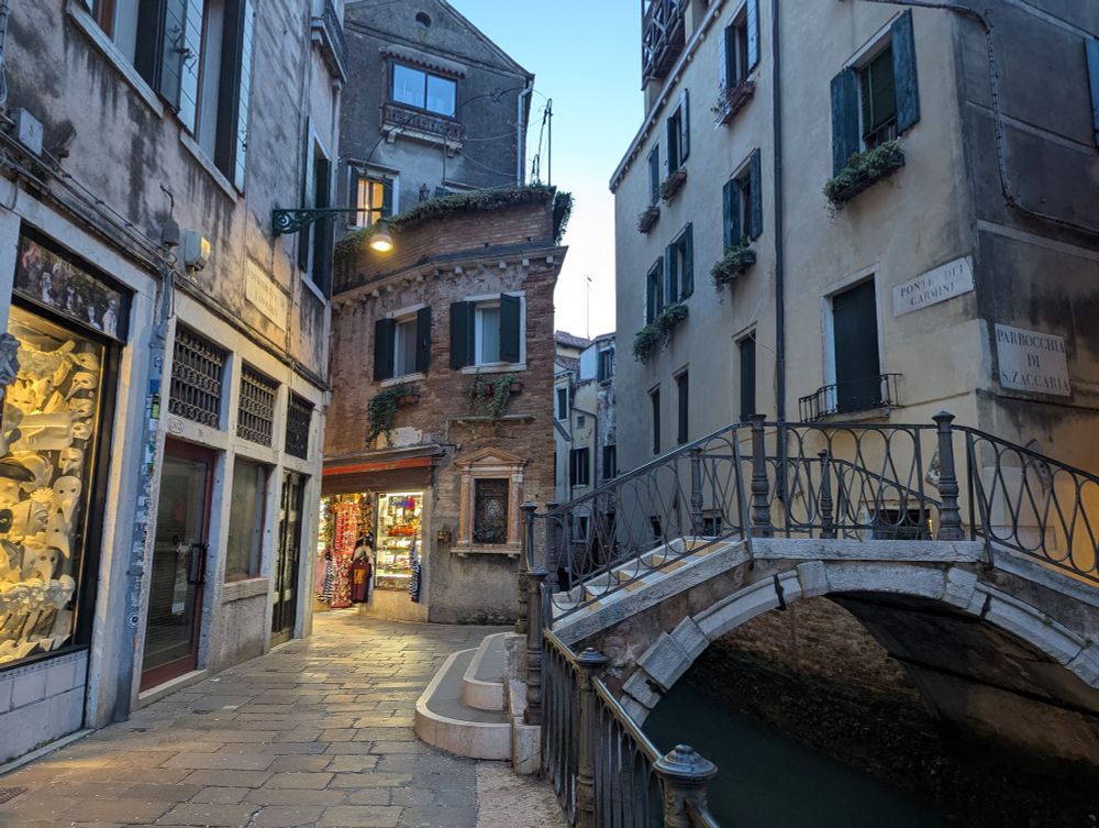 Ponte dei Carmini, Venice at twilight, shops lit up
