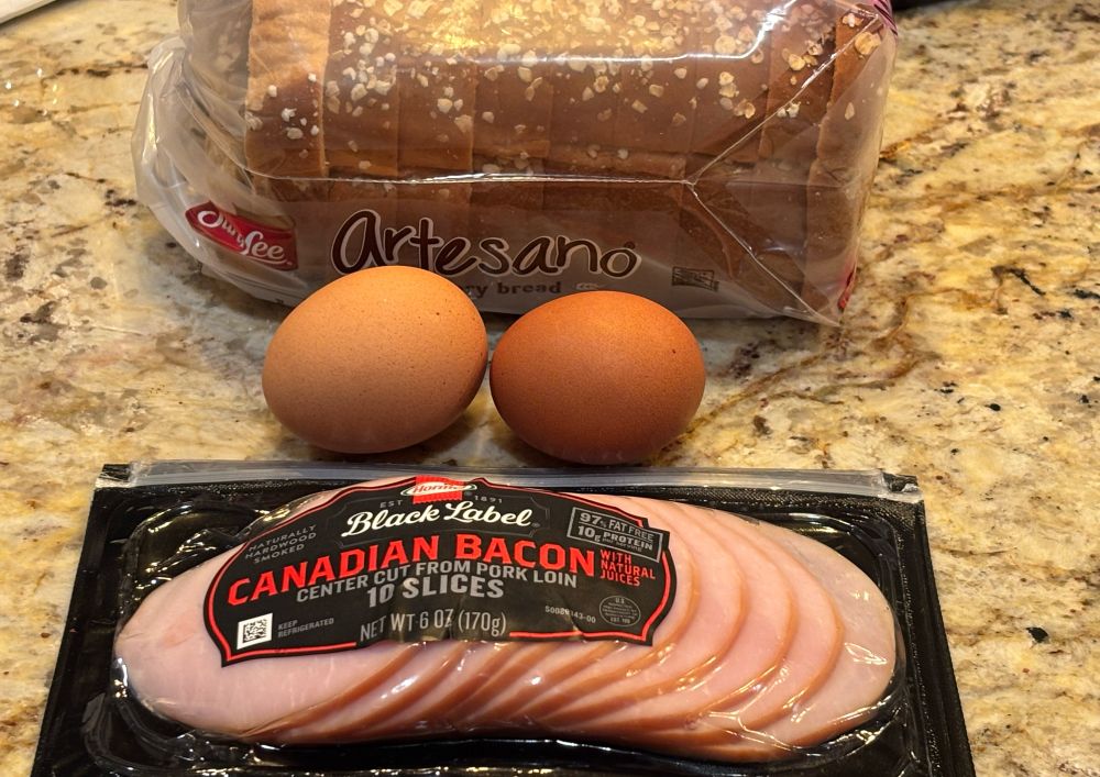 Bread, eggs and Canadian bacon 