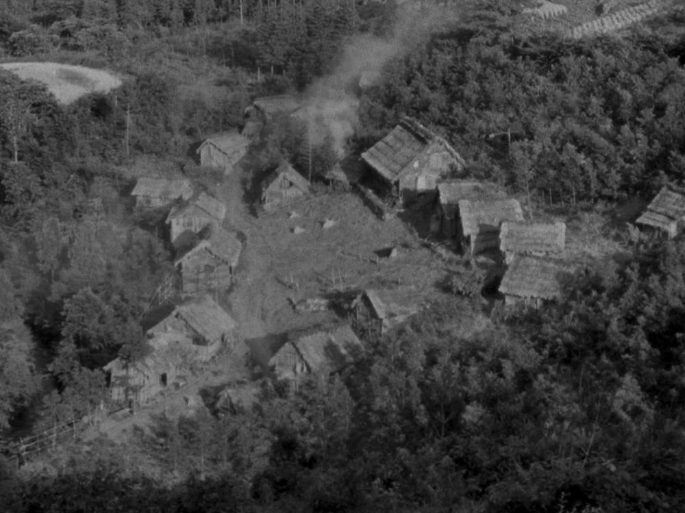 An early image from Akira Kurosawa's Seven Samurai looking down at the farming village. 