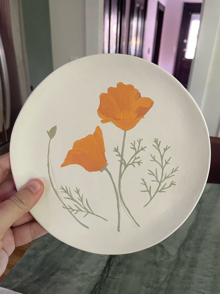 California poppies on a plate that actually look a lot like poppies