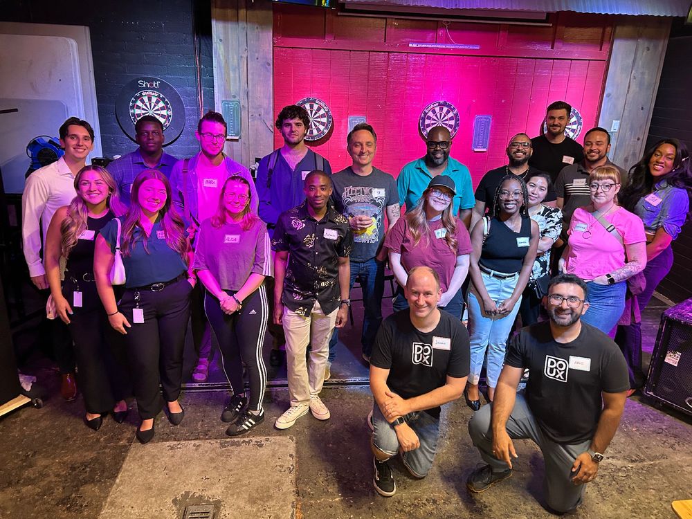 Group photo of ~20 of the attendees from the meetup.
