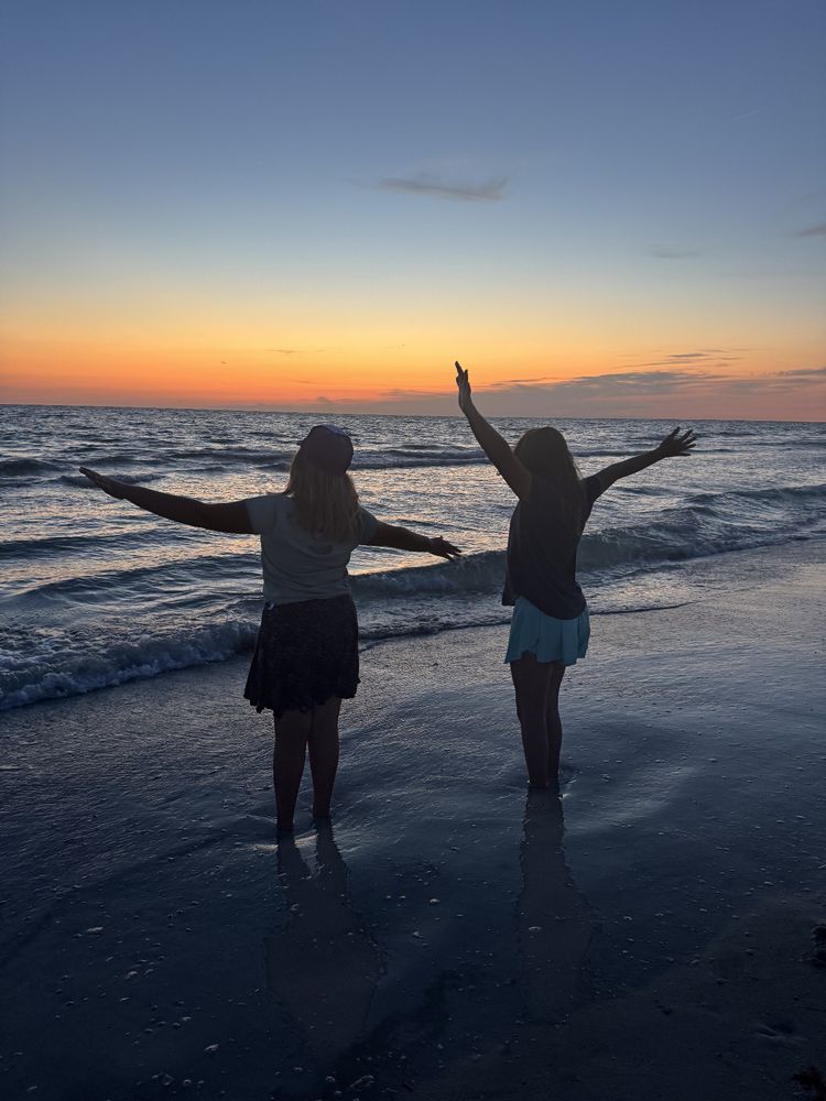Silhouettes of my 2 kids playing in the surf just after sunset.