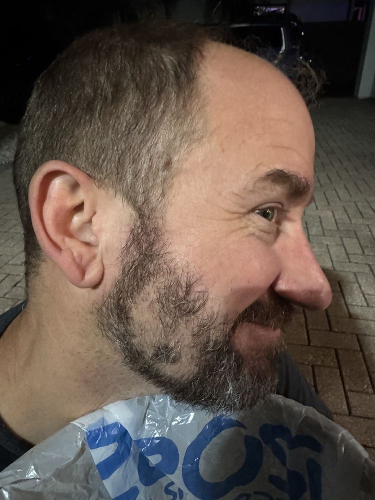 A six shaved into the left side of my beard.