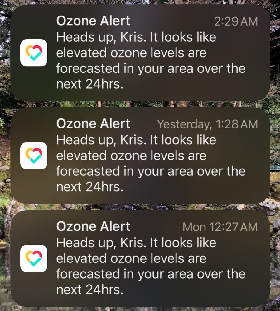Daily notifications from the Mila air purifier app. Text: “Heads up, Kris. It looks like elevated ozone levels are forecasted in your area over the next 24 hours.”