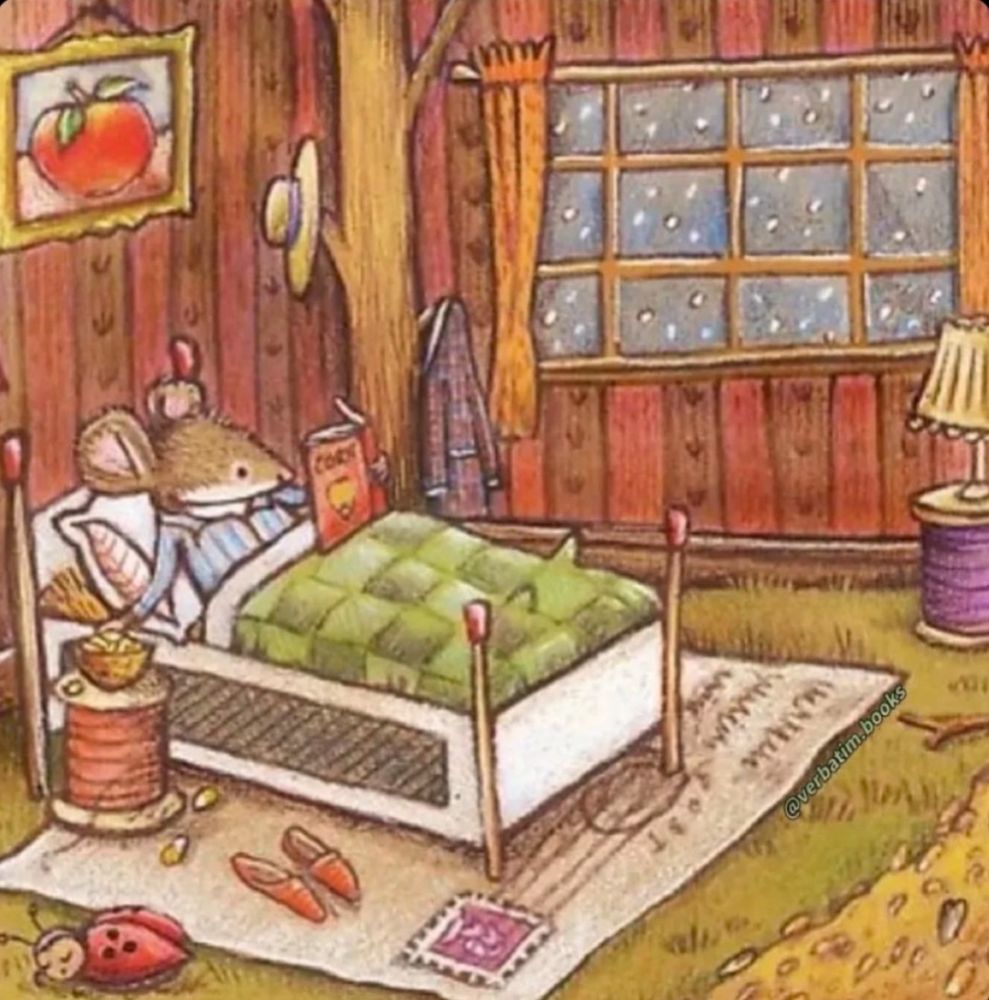 Mouse reading in bed 