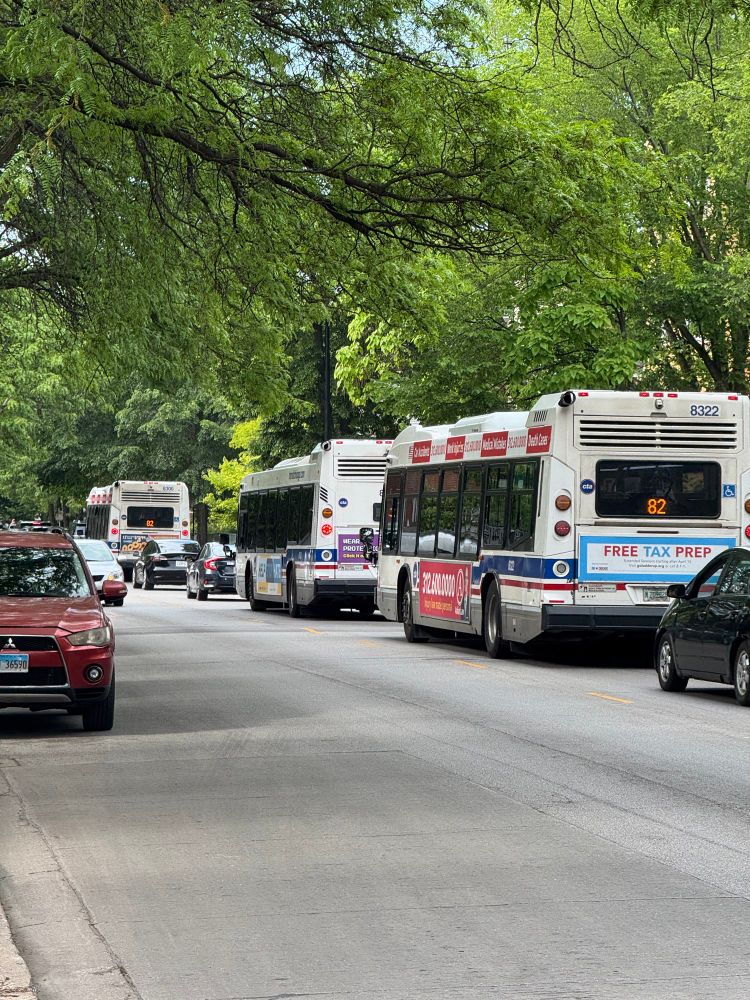 Three Kimball north bound busses bunched up