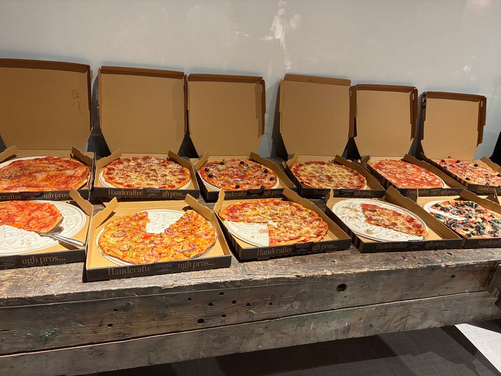 Pizza in boxes.