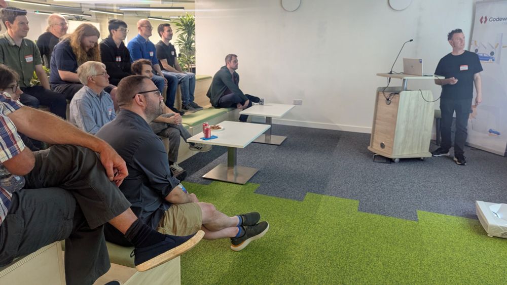 Audience watching Mike Irving give his presentation