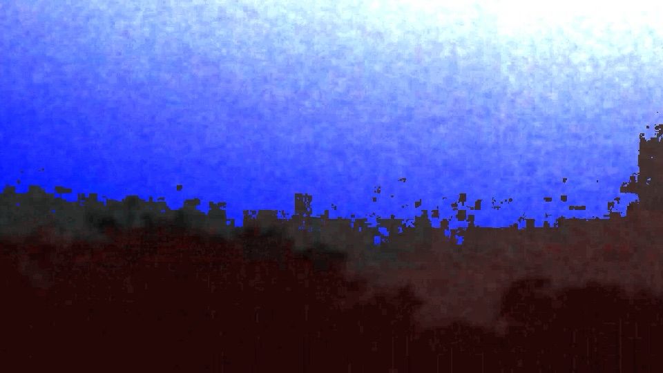 distorted blue image of a skyline teasing SOMETHING 