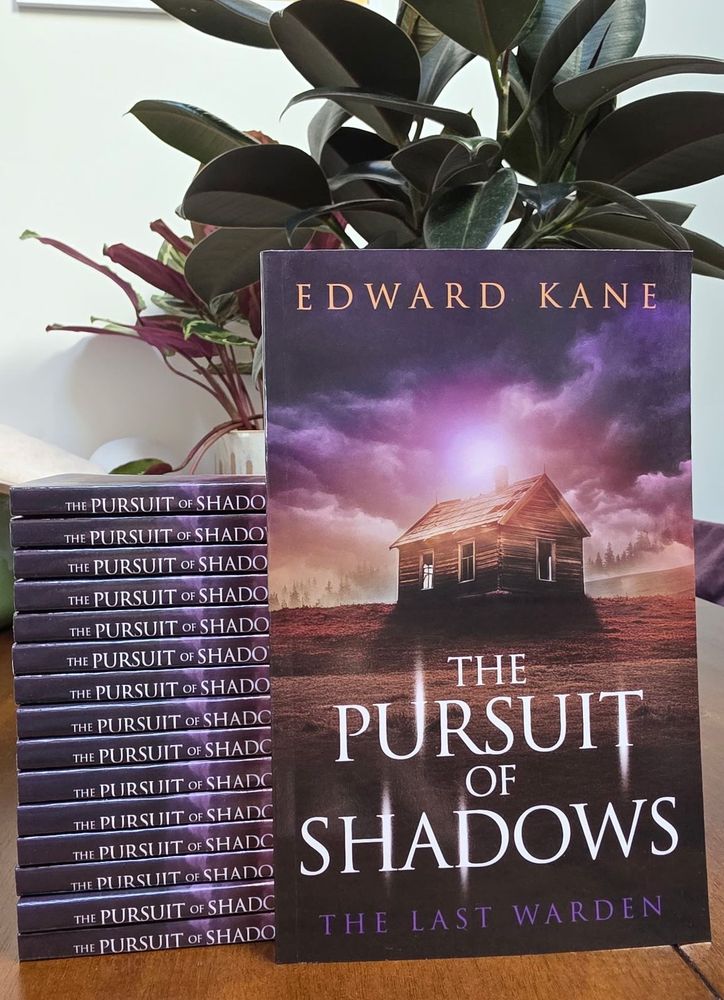 Some paperback copies of Book 1 of the Pursuit of Shadows series by Edward Kane