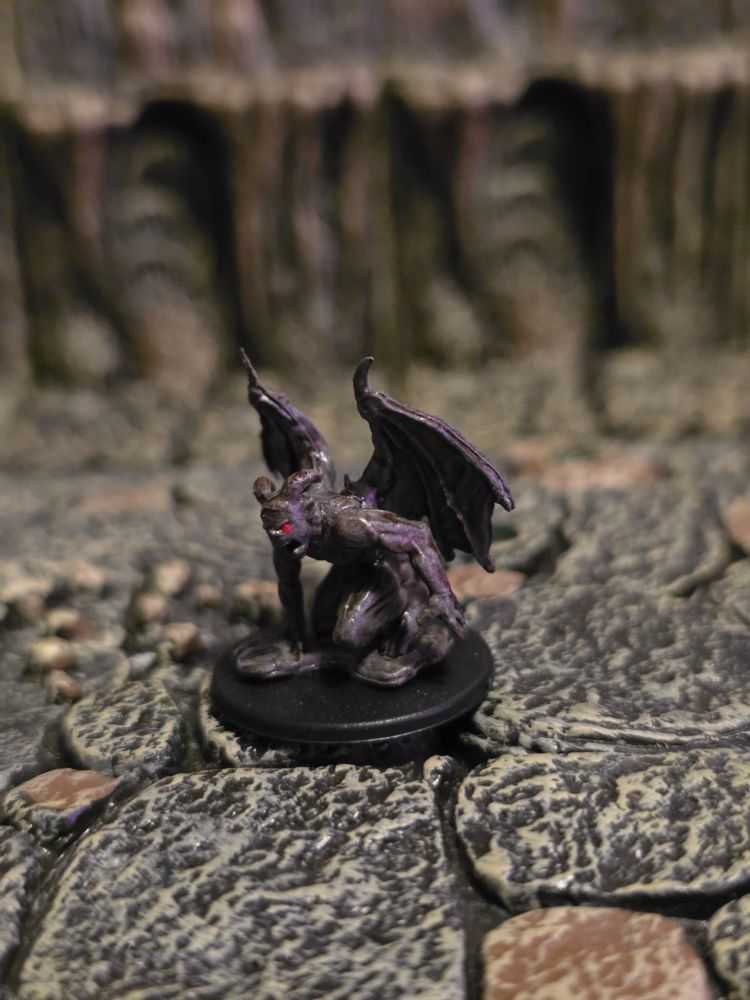 A side view of the right gargoyle's mini, showing off their more aggressive posing.