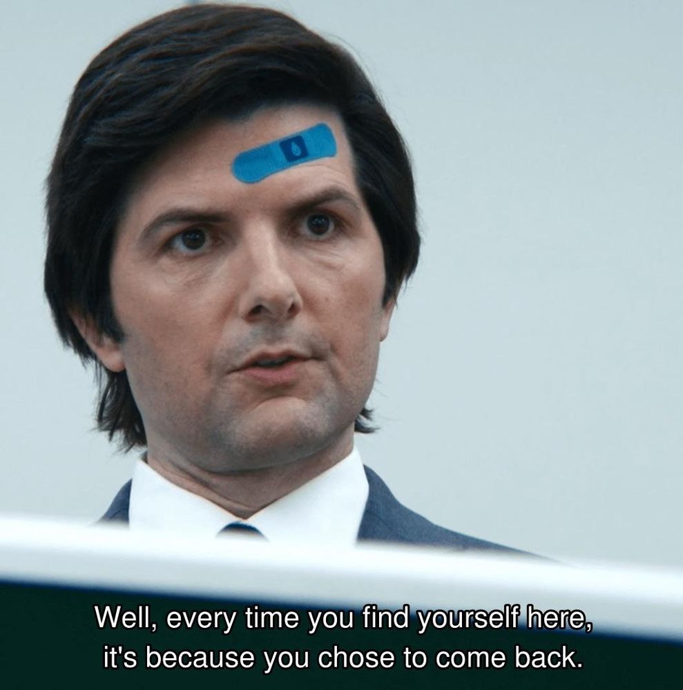 A screencap from the show Severance. It shows Adam Scott as Mark S. with a blue band aid on his forehead. The caption reads "Well, every time you find yourself here, it's because you chose to come back."