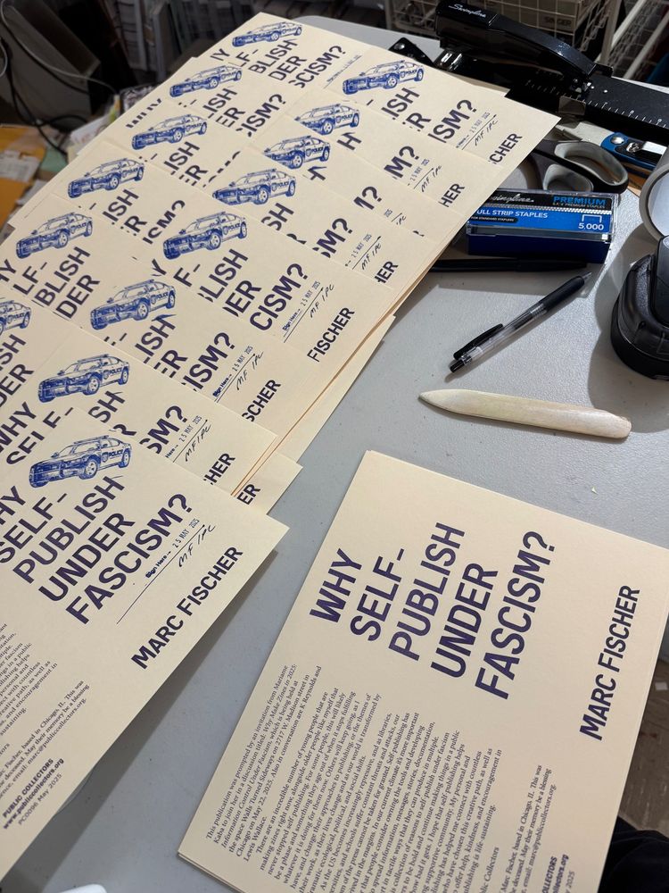An assembly line of "Why Self-Publish Under Fascism?" booklet covers (which are rubber stamped, dated, and initialed on the cover by me.)