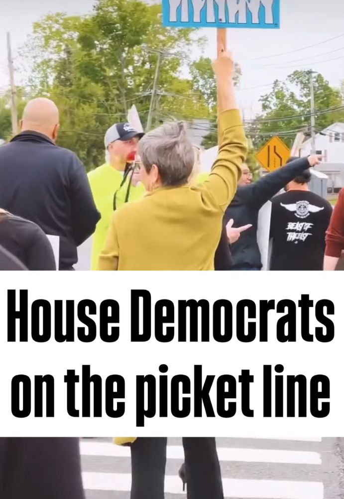 People walking with picket signs