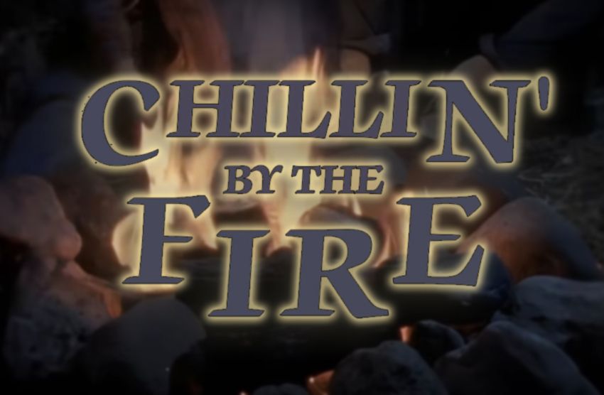 A screenshot of a campfire from 90s Nickelodeon show Are You Afraid of the Dark?, with the story title text appearing over and reading "Chillin' By The Fire"