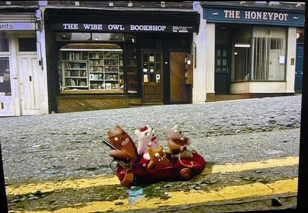 The Wise Owl Bookshop, Bristol in the background of a scene from Aardman TV series Rex the Runt. 