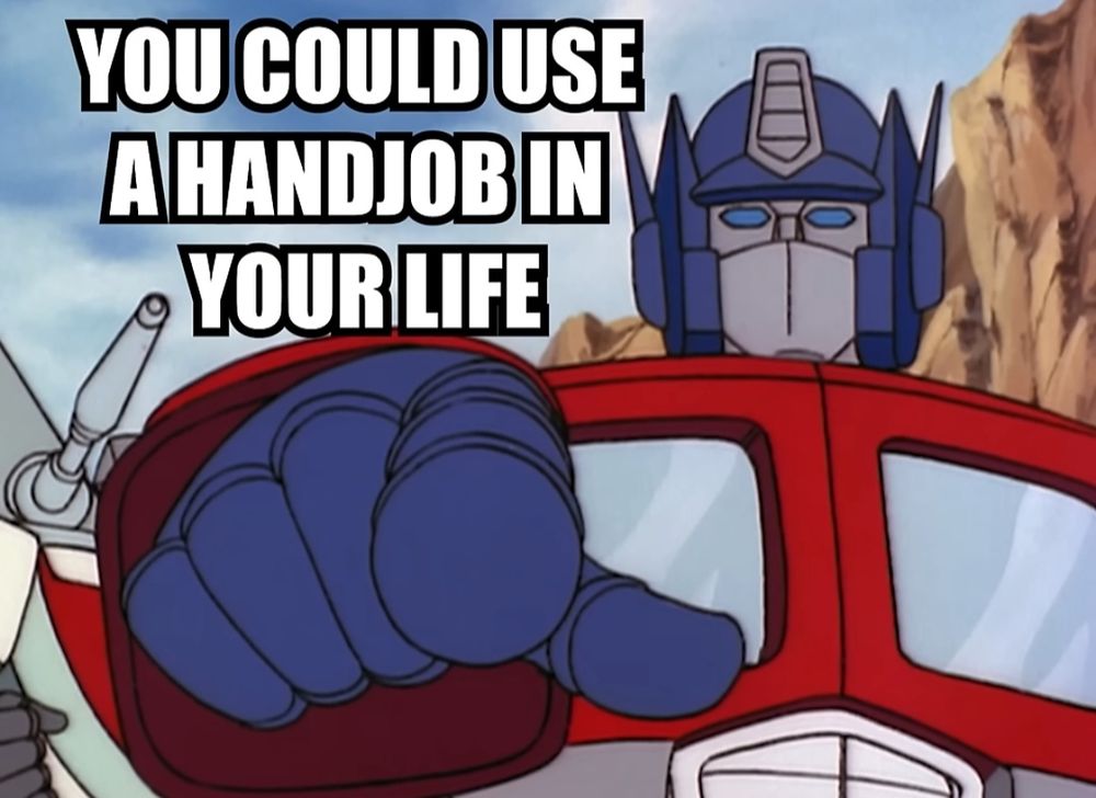 Optimus Prime pointing at the viewer with the caption 