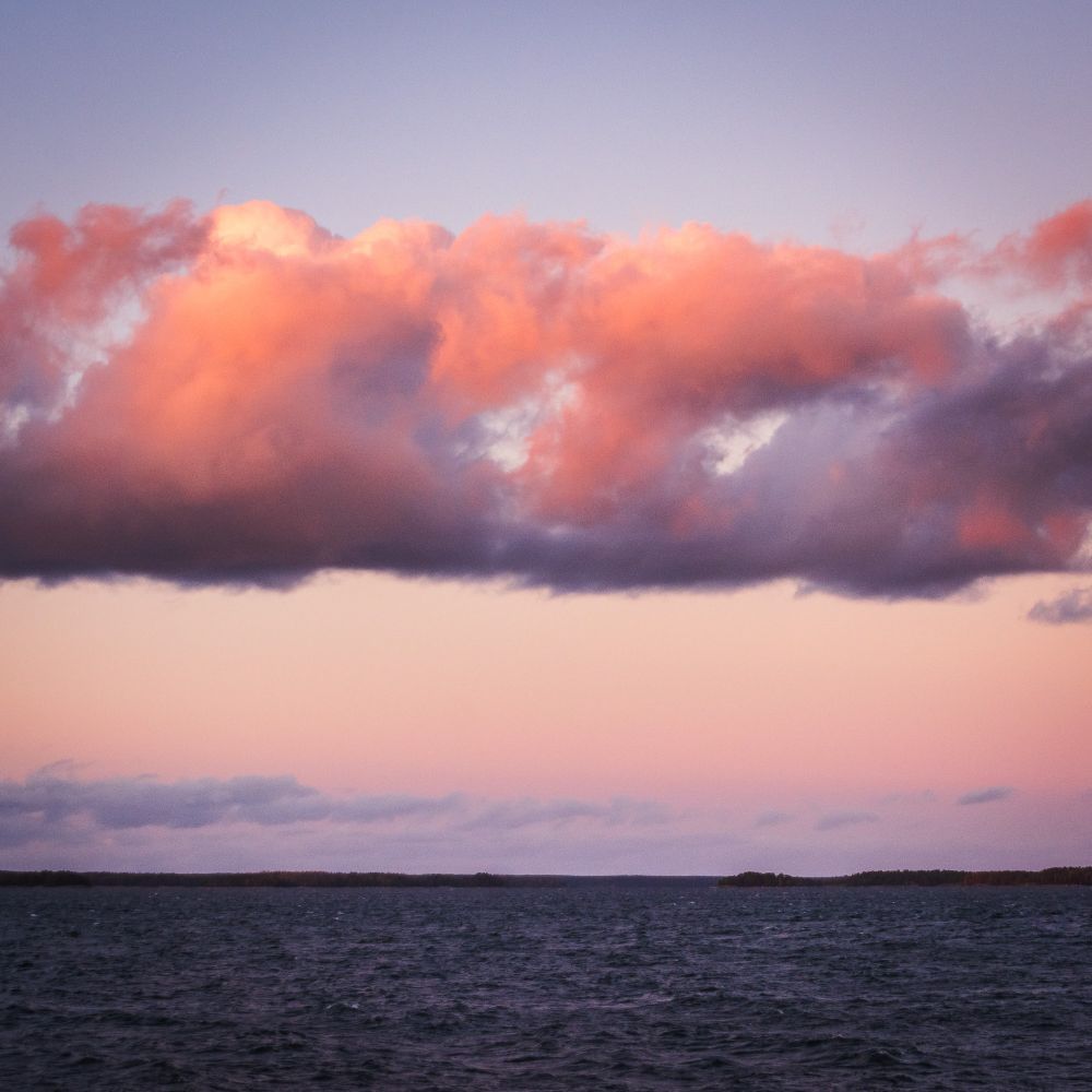 Minimalism, rule of fourths, autumn clouds over sea