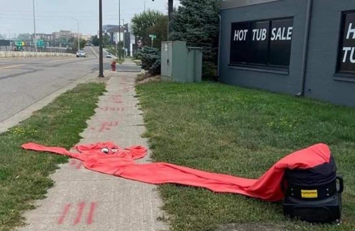 Deflated inflation arm-flailing tube man