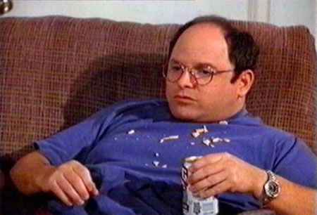 George Costanza on couch covered in chips