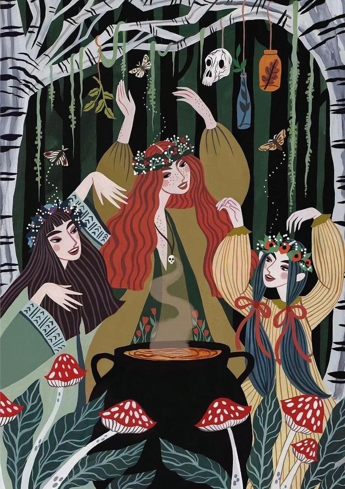 Three smiling women around a cauldron. They are surrounded by trees plants and mushrooms and wear crowns of flowers. Carious plants natural elements and butterflies surround the women 