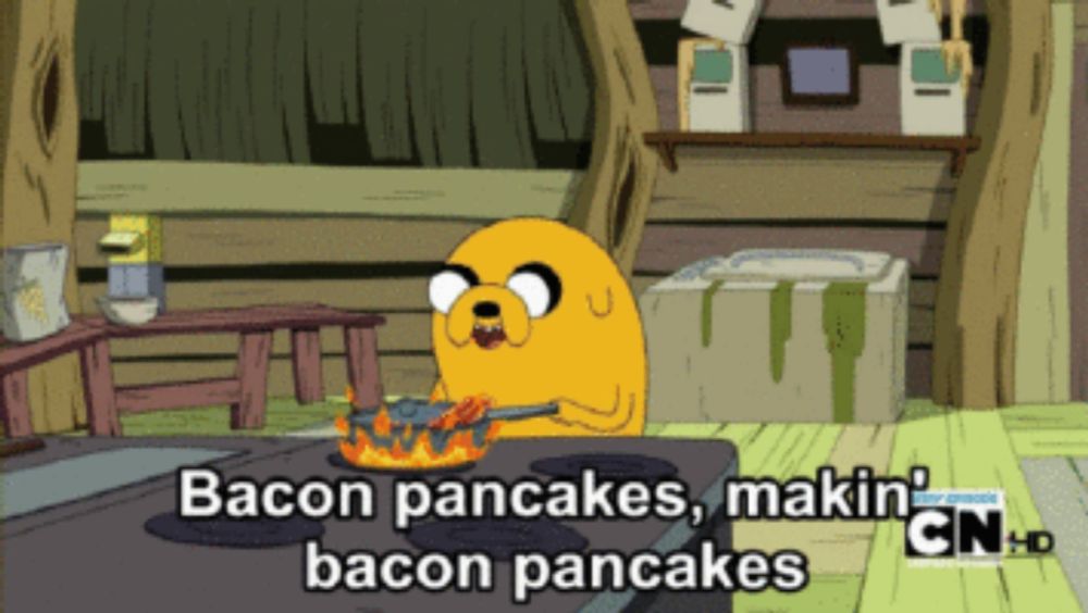 a cartoon character is cooking bacon pancakes and says bacon pancakes makin ' bacon pancakes